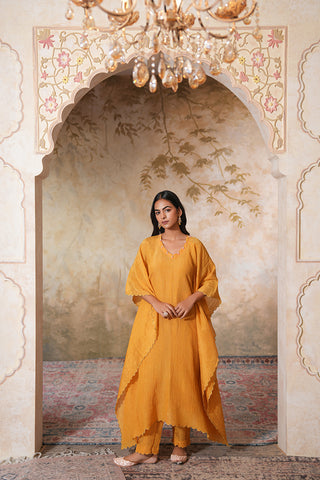 Mustard Crushed Tissue Silk Scallop Embroidered Kaftan With Pink Chanderi Narrow Pants With Scallop Embroidery On Crushed Tissue and Pink Mul Cotton Slip - Set of 3