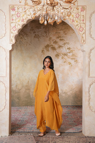 Mustard Crushed Tissue Silk Scallop Embroidered Kaftan With Pink Chanderi Narrow Pants With Scallop Embroidery On Crushed Tissue and Pink Mul Cotton Slip - Set of 3
