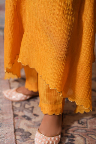 Mustard Crushed Tissue Silk Scallop Embroidered Kaftan With Pink Chanderi Narrow Pants With Scallop Embroidery On Crushed Tissue and Pink Mul Cotton Slip - Set of 3