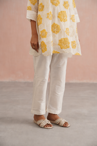 Mul chanderi applique and pearl embroidered oversized top paired with cotton pants