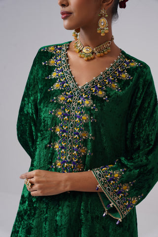 Electric Green zardozi embroidered velvet kurta paired with royal blue velvet pants and embroidered organza silk dupatta