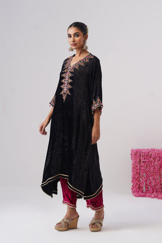 Black zardozi embroidered velvet kurta paired with rani pink velvet pants and embroidered organza silk dupatta