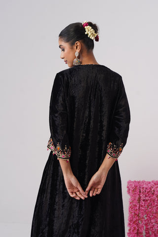 Black zardozi embroidered velvet kurta paired with rani pink velvet pants and embroidered organza silk dupatta