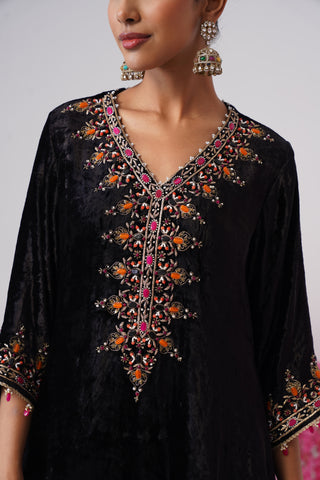 Black zardozi embroidered velvet kurta paired with rani pink velvet pants and embroidered organza silk dupatta