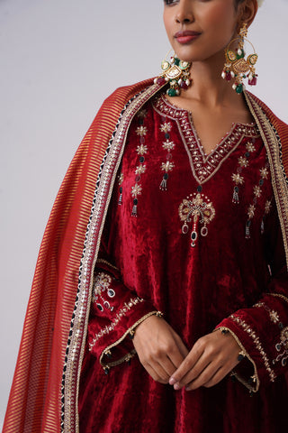 Red zardozi embroidered velvet kurta paired with velvet pants and embroidered tissue chanderi stripe dupatta
