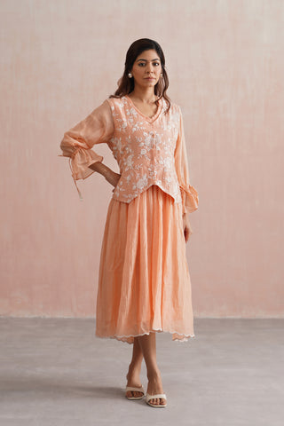 A graceful peach midi dress