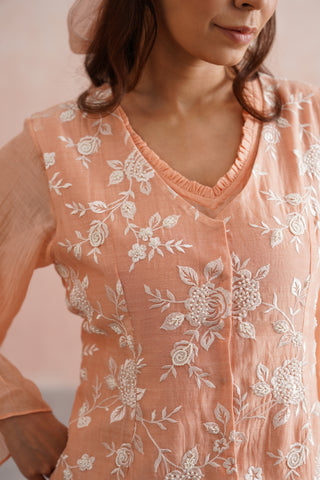 A graceful peach midi dress