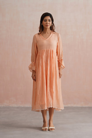 A graceful peach midi dress