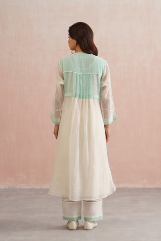 Elegant ivory kurta adorned with delicate mint floral embroidery