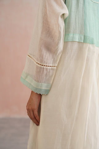 Elegant ivory kurta adorned with delicate mint floral embroidery