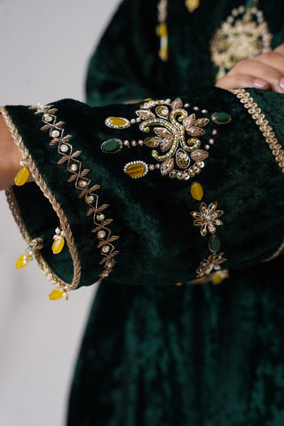 Emerald zardozi embroidered velvet kurta paired with yellow velvet pants and embroidered tissue chanderi stripe dupatta