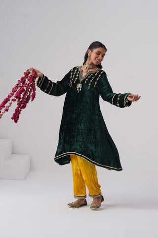 Emerald zardozi embroidered velvet kurta paired with yellow velvet pants and embroidered tissue chanderi stripe dupatta