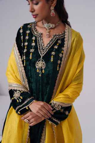Emerald zardozi embroidered velvet kurta paired with yellow velvet pants and embroidered tissue chanderi stripe dupatta