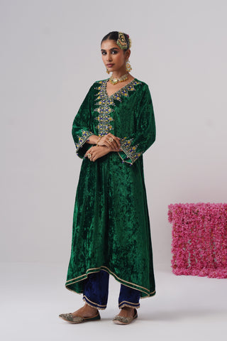 Electric Green zardozi embroidered velvet kurta paired with royal blue velvet pants and embroidered organza silk dupatta