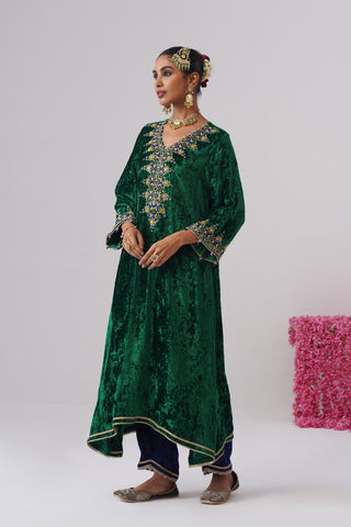Electric Green zardozi embroidered velvet kurta paired with royal blue velvet pants and embroidered organza silk dupatta