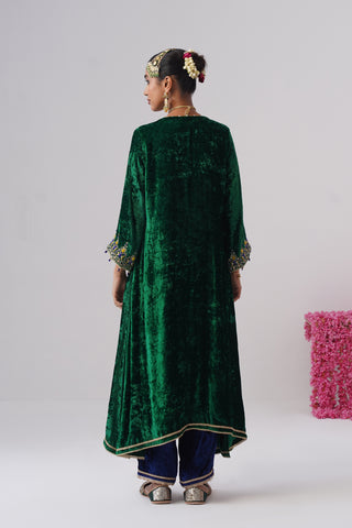 Electric Green zardozi embroidered velvet kurta paired with royal blue velvet pants and embroidered organza silk dupatta
