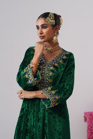 Electric Green zardozi embroidered velvet kurta paired with royal blue velvet pants and embroidered organza silk dupatta