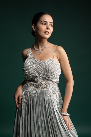 Serene Mint Green Gown with Delicate Floral Appliqué and Soft Pleats