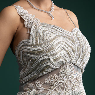 Serene Mint Green Gown with Delicate Floral Appliqué and Soft Pleats