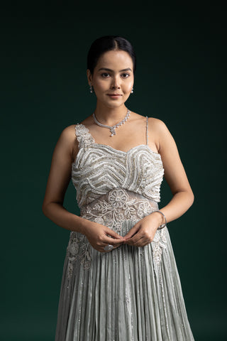 Serene Mint Green Gown with Delicate Floral Appliqué and Soft Pleats