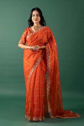 Vibrant Tangerine Organza Saree with Intricate Lattice Embroidery