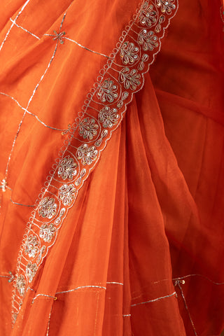 Vibrant Tangerine Organza Saree with Intricate Lattice Embroidery