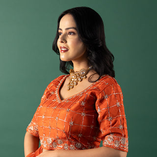 Vibrant Tangerine Organza Saree with Intricate Lattice Embroidery