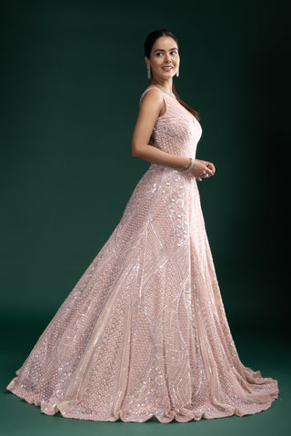 Soft Blush Pink Sleeveless Gown with Linear Geometric Sequin Detailing and Flattering Flared Silhouette