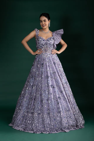 Shimmering Mystic Lavender Gown With Dramatic Shoulder Detail