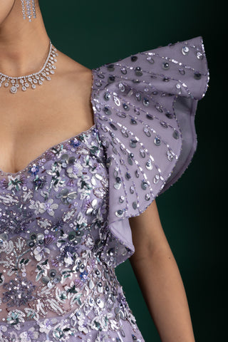 Shimmering Mystic Lavender Gown With Dramatic Shoulder Detail