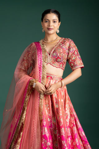 Blush Coral Lehenga with Opulent Golden Zari Accents