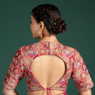 Blush Coral Lehenga with Opulent Golden Zari Accents