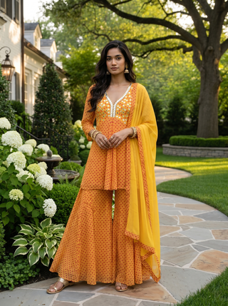 Yellow short kurti with sharara pants